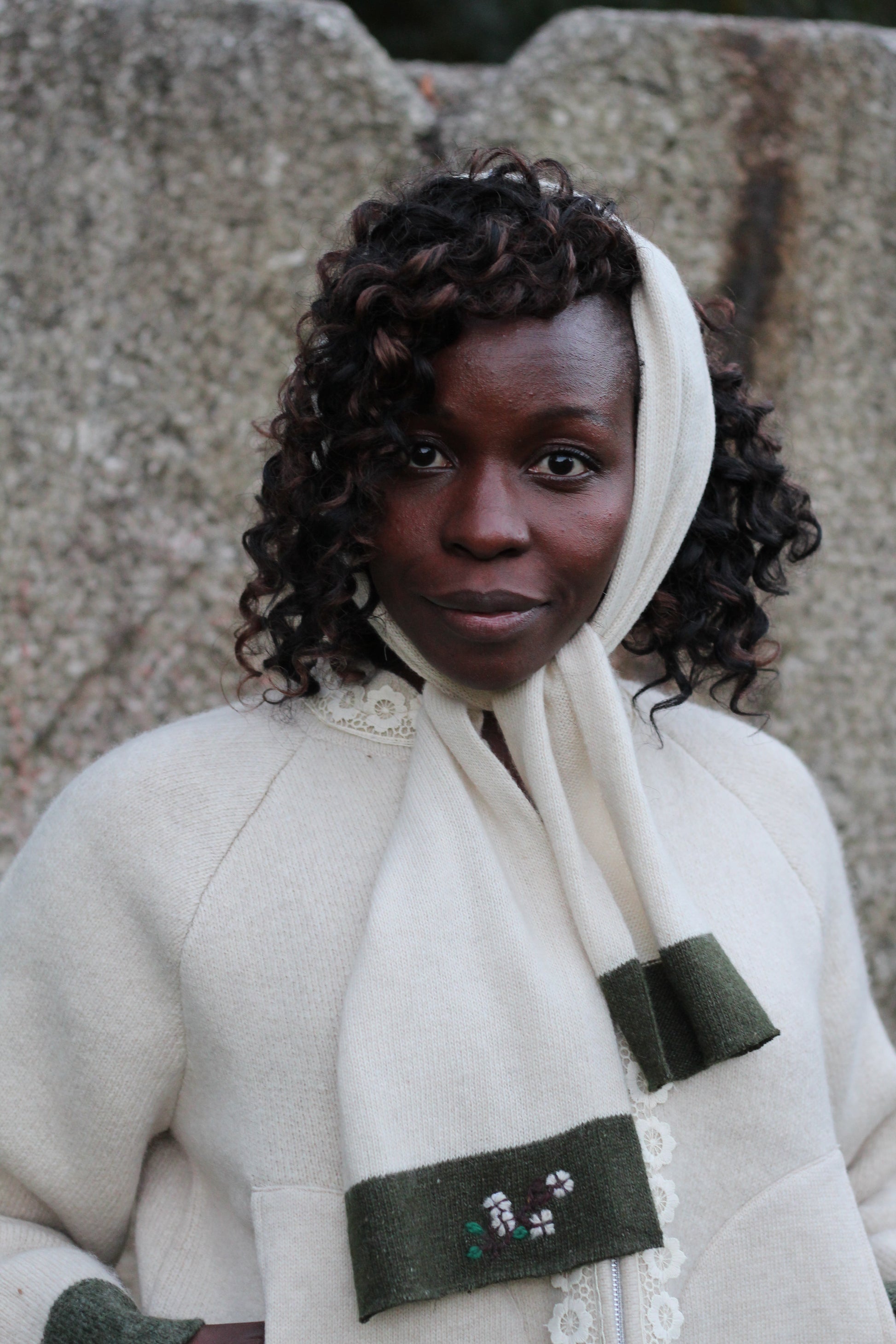 Unisex beige wool scarf worn with Unisex beige wool jacket front view close up picture