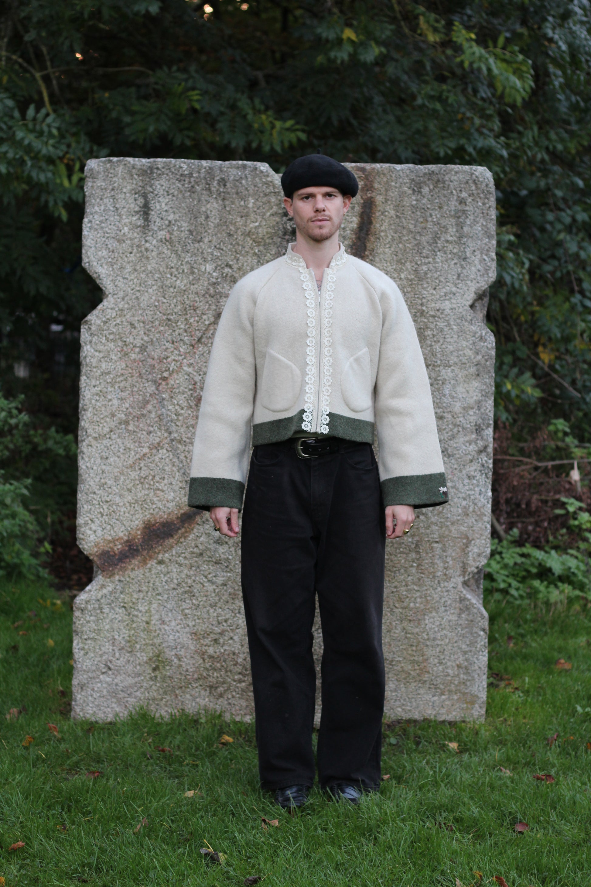 unisex beige wool cropped coat on model, front view middle distance 